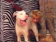 Bizarre beastiality fetish movie featuring a stud dressed as a leopard jerking off a dog